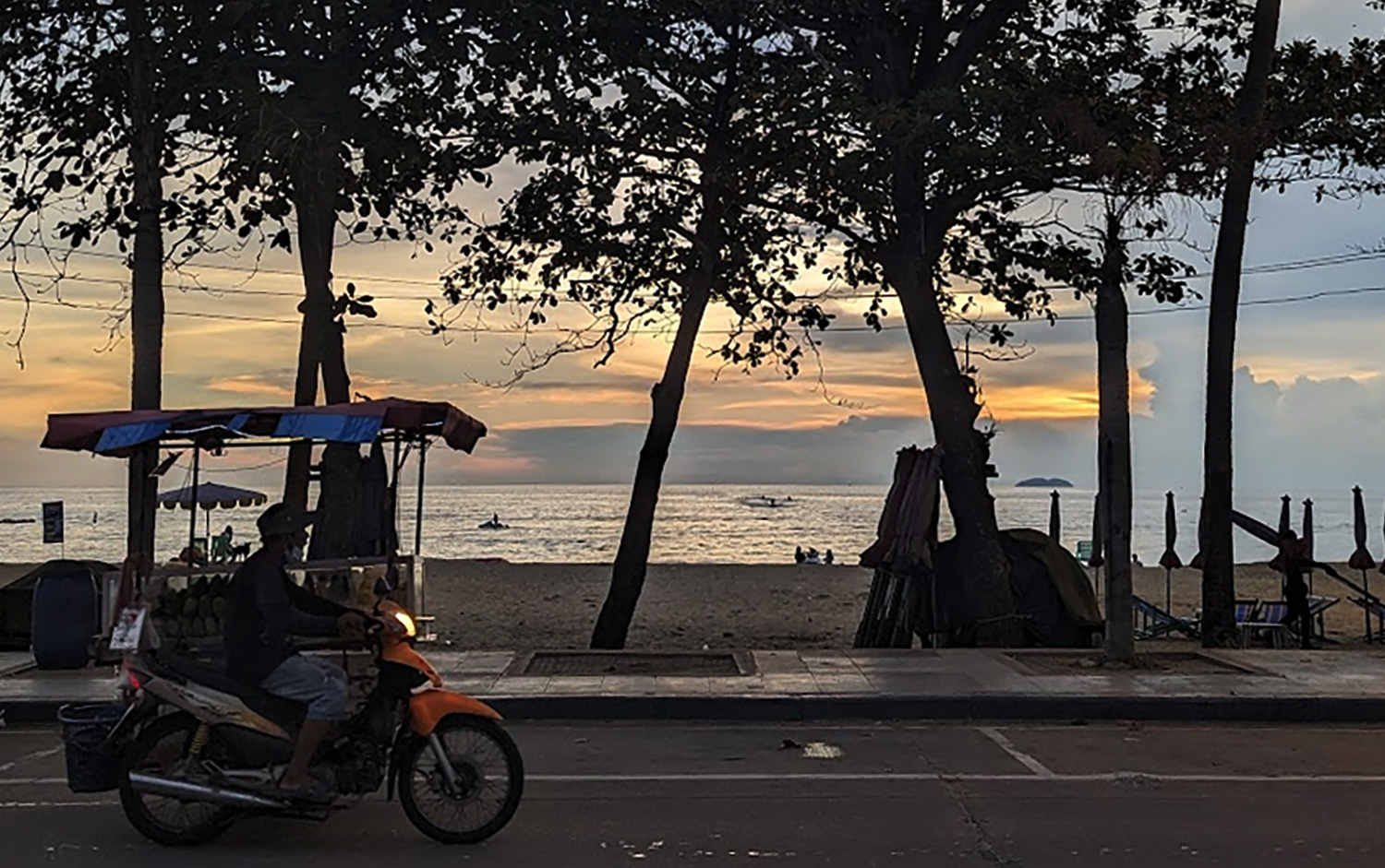 Jomtien Beach Pattaya Thailand long sandy beach and calm sea with fewer crowds during daytime
